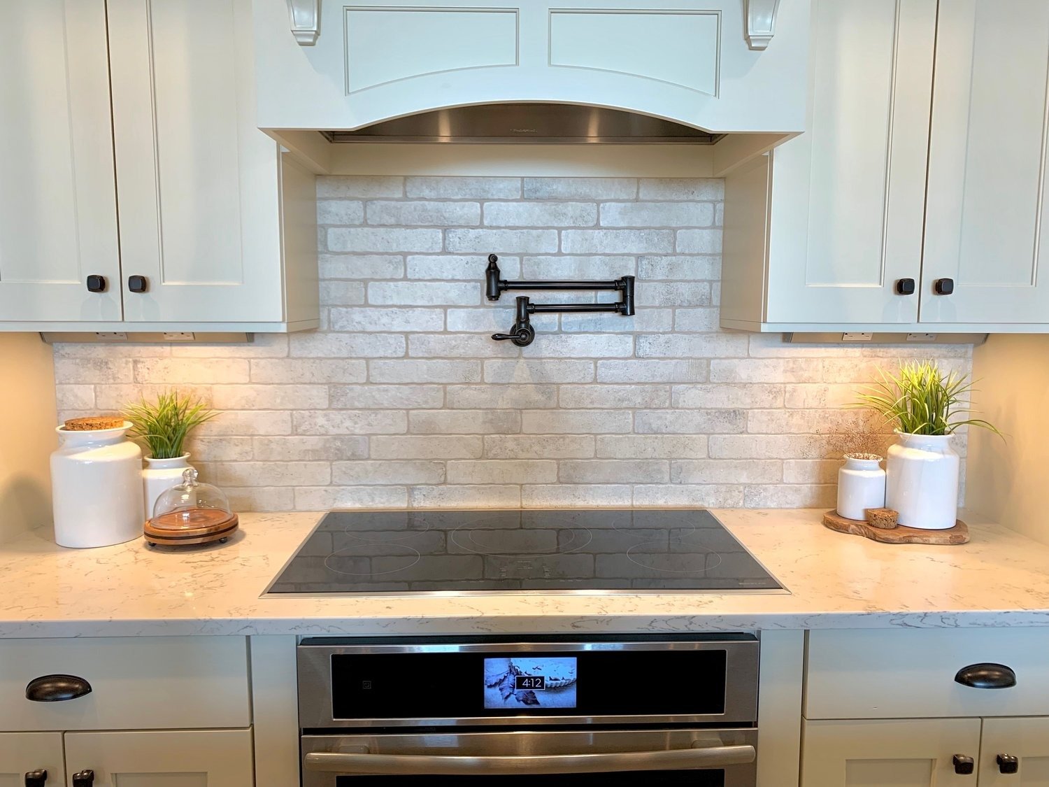 Quartz and granite countertop installation with clean seams and support