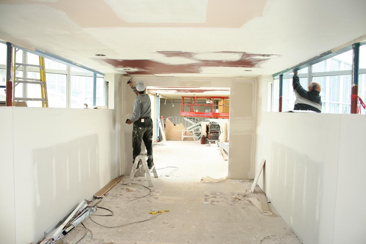Commercial remodel site with drywall and finishing work in progress